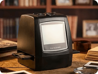 The MemoryVault Box scanner in a warm home library